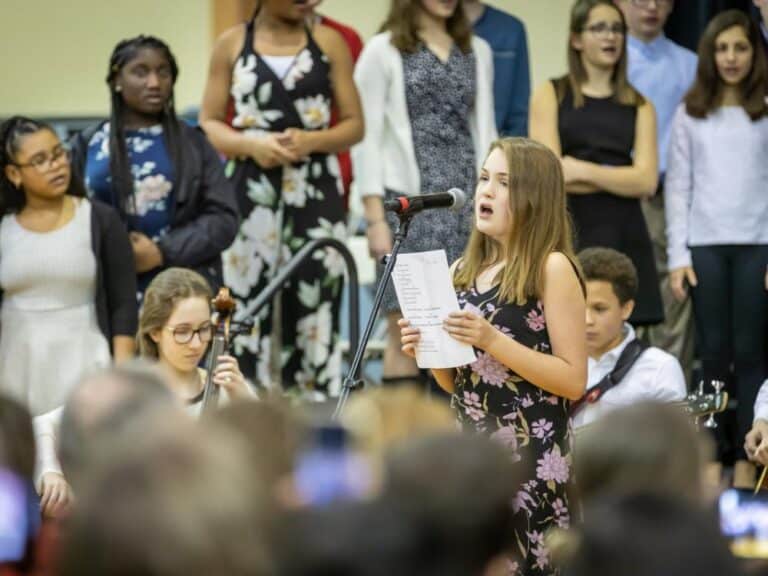 A girl presents a solo at the Winter Concert