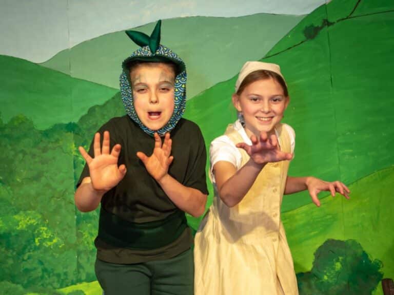 Two fifth grade actors on stage