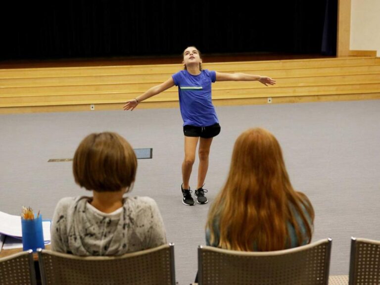 A student in theater arts class