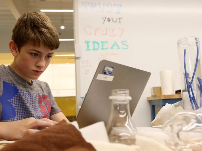 Boy working on a laptop