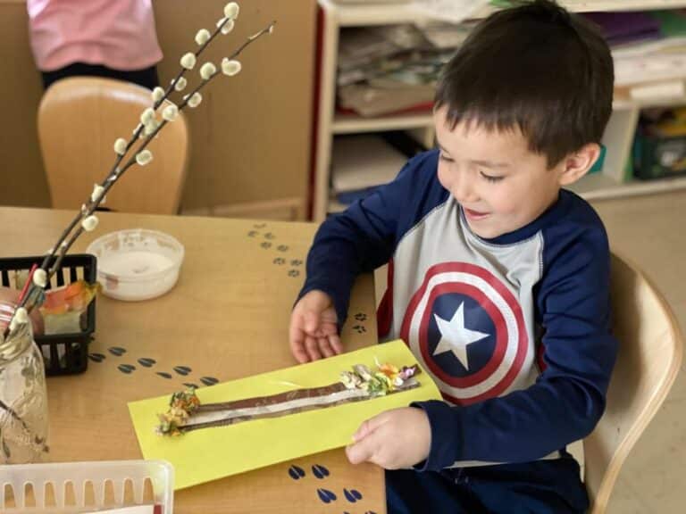 A student works on a collage project