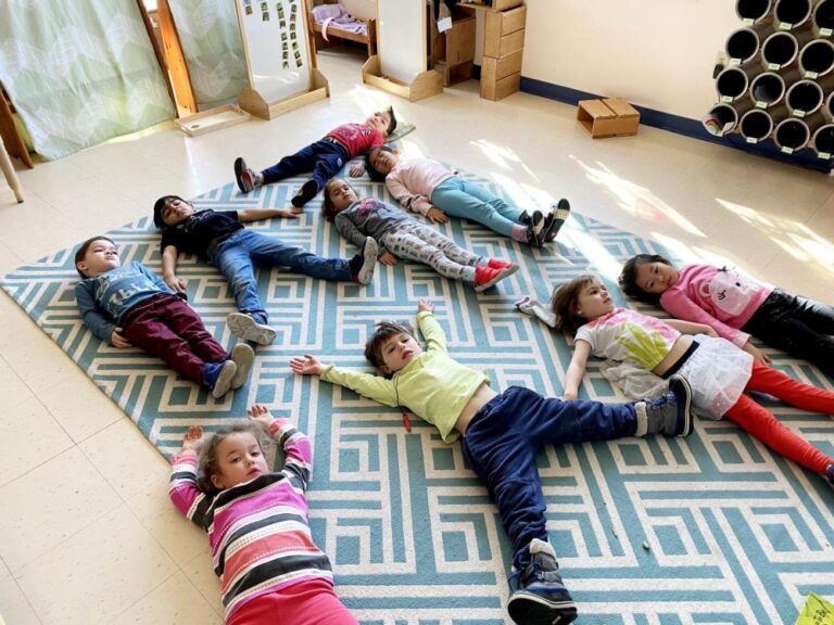 Pre-k students try out yoga poses