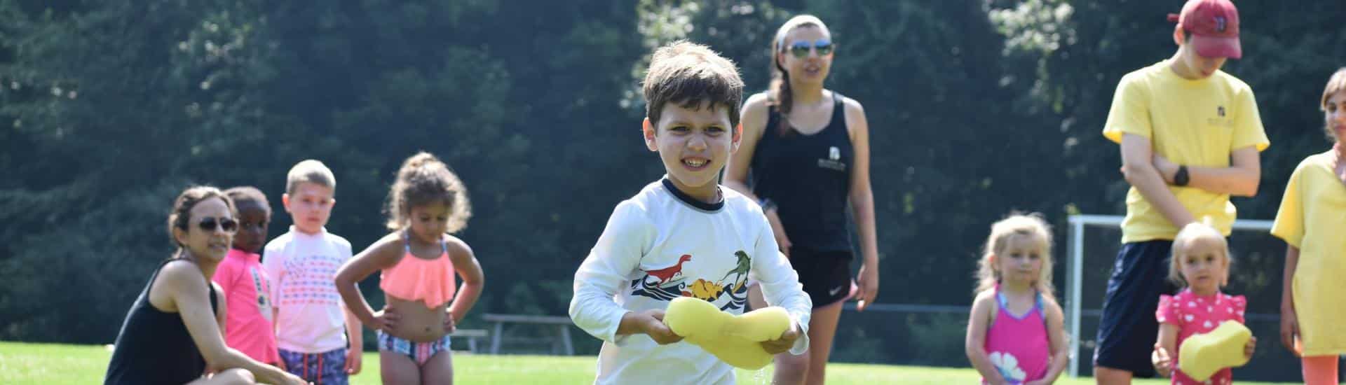 Children playing summer camp games