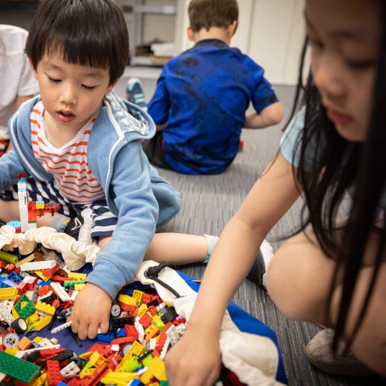 Two young students in the LEGO Design enrichment class